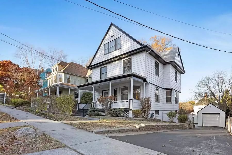 Renovated home exterior by NSK Home Improvement